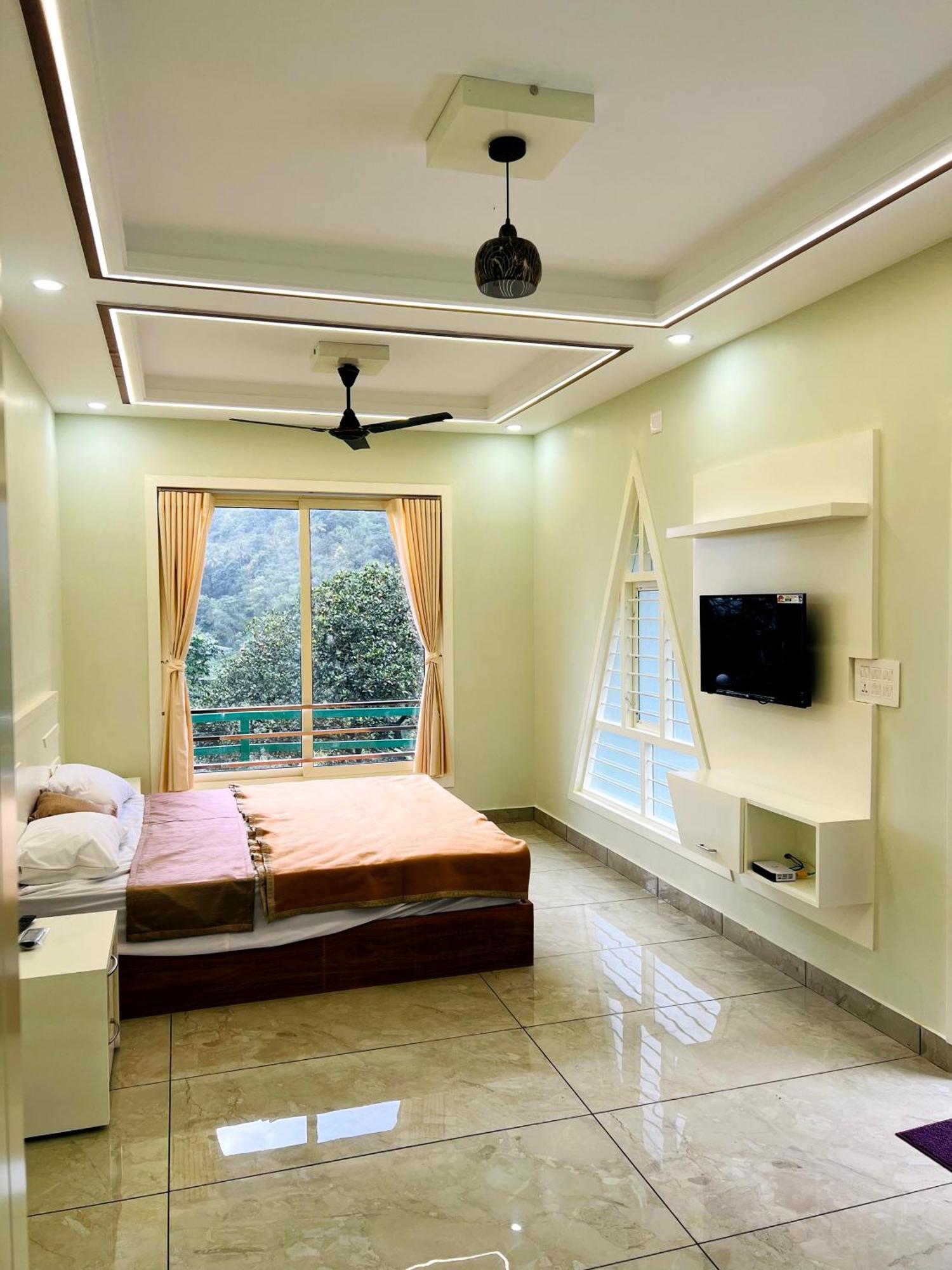 Royal Mount Inn Resorts Paithalmala Номер фото